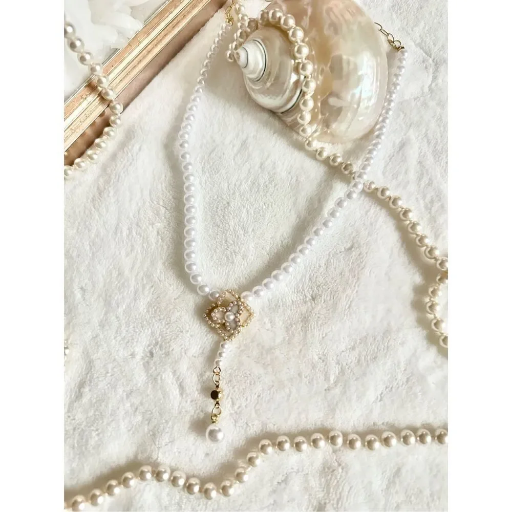 Faux pearl and cream rose statement necklace